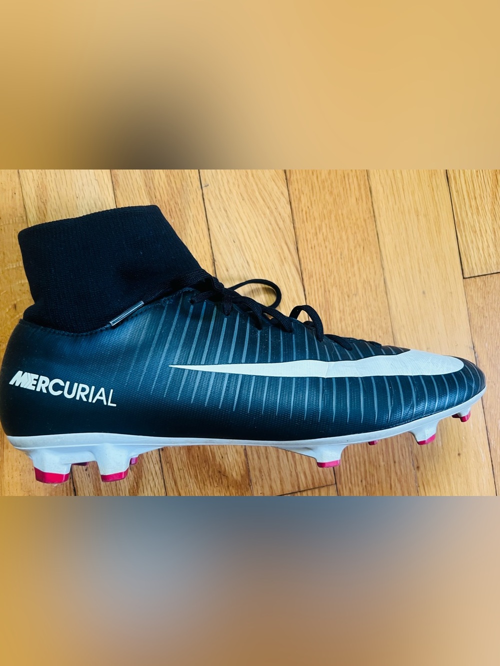 Nike Men’s Mercurial Black Soccer Cleats with White Swoosh and Pink Stud Accents